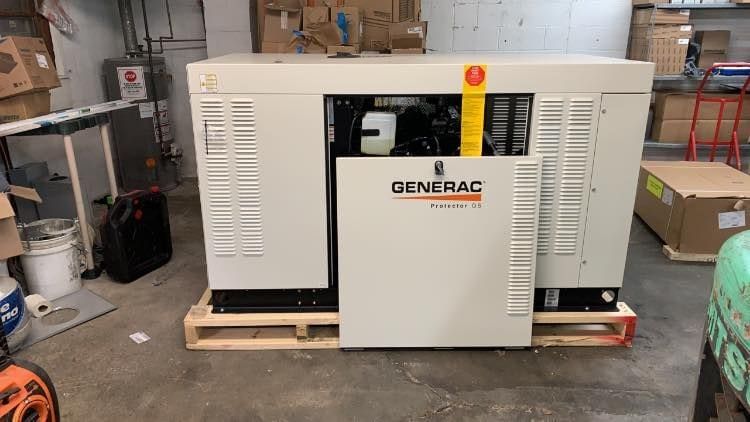 A Generac Protector standby generator on a pallet in the TSD Electric shop